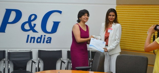 Being felicitated by Ms. Sonali Dhawan, Marketing Director of P & G - India